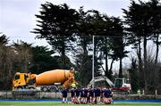 7 February 2023; CUS players huddle before the Bank of Ireland Leinster Rugby Schools Junior Cup First Round match between St Michael’s College and CUS at Energia Park in Dublin. Photo by Ben McShane/Sportsfile