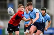 7 February 2023; Joe Kennedy of St Michael's College in action against David Ginnelly of CUS during the Bank of Ireland Leinster Rugby Schools Junior Cup First Round match between St Michael’s College and CUS at Energia Park in Dublin. Photo by Ben McShane/Sportsfile
