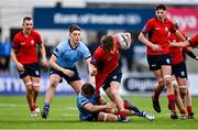 7 February 2023; Andrew Maguire of CUS is tackled by Owen Twomey of St Michael's College during the Bank of Ireland Leinster Rugby Schools Junior Cup First Round match between St Michael’s College and CUS at Energia Park in Dublin. Photo by Ben McShane/Sportsfile