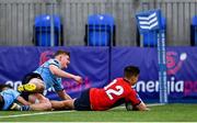 7 February 2023; David Li of CUS scores his side's first try during the Bank of Ireland Leinster Rugby Schools Junior Cup First Round match between St Michael’s College and CUS at Energia Park in Dublin. Photo by Ben McShane/Sportsfile