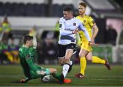 7 February 2023; Cameron Elliott of Dundalk has a shot on goal saved by Wexford goalkeeper Colm Cox during the Pre-Season Friendly match between Dundalk and Wexford at Oriel Park in Dundalk, Louth. Photo by Ben McShane/Sportsfile