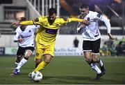 7 February 2023; Karl Chambers of Wexford in action against Cameron Elliott of Dundalk during the Pre-Season Friendly match between Dundalk and Wexford at Oriel Park in Dundalk, Louth. Photo by Ben McShane/Sportsfile