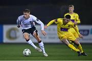 7 February 2023; Hayden Muller of Dundalk in action against Aaron Robinson of Wexford during the Pre-Season Friendly match between Dundalk and Wexford at Oriel Park in Dundalk, Louth. Photo by Ben McShane/Sportsfile