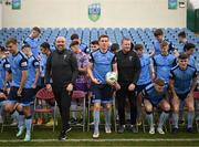 4 February 2023; UCD manager Andrew Myler, captain Jack Keaney, assistant manager William O'Connor and players break from their squad photograph taken during a UCD squad portrait session at UCD Bowl in Dublin. Photo by Stephen McCarthy/Sportsfile