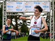 8 February 2023; Cormac Dixon of Holy Family Community School Rathcoole celebrates as he crosse the line to win the Senior Boys race during the 123.ie Leinster Schools Cross Country 2023 at Santry Demesne in Dublin. Photo by David Fitzgerald/Sportsfile