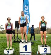 8 February 2023; Senior girls podium, first place Hannah Kehoe of Loreto Kilkenny, centre, second place Aimee Wallace of St Finian's College, right, and third place Emma McEvoy of Loreto Stephens Green during the 123.ie Leinster Schools Cross Country 2023 at Santry Demesne in Dublin. Photo by David Fitzgerald/Sportsfile