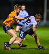 8 February 2023; Jack Glynn of University of Limerick in action against Jack Bryant of DCU Dóchas Éireann during the Electric Ireland HE GAA Sigerson Cup Semi-Final match between UL and DCU Dochas Éireann at Netwatch Cullen Park in Carlow. Photo by Ben McShane/Sportsfile
