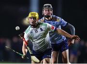 9 February 2023; Mark Rogers of University of Limerick in action against Eoin Ryan of University College Dublin during the Electric Ireland HE GAA Fitzgibbon Cup Quarter-Final match between University of Limerick and University College Dublin at UL Grounds in Limerick. Photo by Michael P Ryan/Sportsfile