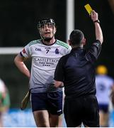 9 February 2023; Darragh Corcoran of University of Limerick is shown a yellow card by referee Fergal Horgan during the Electric Ireland HE GAA Fitzgibbon Cup Quarter-Final match between University of Limerick and University College Dublin at UL Grounds in Limerick. Photo by Michael P Ryan/Sportsfile