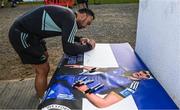 9 February 2023; Charlie Ngatai signs a picture of Brian Deeny during a Leinster Rugby open training session at Wexford Wanderers RFC in Wexford. Photo by Harry Murphy/Sportsfile