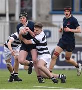10 February 2023; Tom Burke of Wesley College is tackled by Ryan Grant of Belvedere College during the Bank of Ireland Leinster Rugby Schools Junior Cup First Round match between Wesley College and Belvedere College at Energia Park in Dublin. Photo by Tyler Miller/Sportsfile