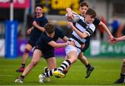10 February 2023; Dylan Lord of Belvedere College is tackled by Matthew Wystepek of Wesley College during the Bank of Ireland Leinster Rugby Schools Junior Cup First Round match between Wesley College and Belvedere College at Energia Park in Dublin. Photo by Tyler Miller/Sportsfile