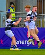 10 February 2023; Rory O'Farrell of Belvedere College, centre, celebrates with teammates Charles Dowse, left, and Jack Craig Coghlan after scoring his side's fifth try during the Bank of Ireland Leinster Rugby Schools Junior Cup First Round match between Wesley College and Belvedere College at Energia Park in Dublin. Photo by Tyler Miller/Sportsfile