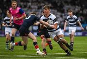 10 February 2023; Alex Clarke of Belvedere College is tackled by Johnny Woods of Wesley College during the Bank of Ireland Leinster Rugby Schools Junior Cup First Round match between Wesley College and Belvedere College at Energia Park in Dublin. Photo by Colm Kelly Morris/Sportsfile