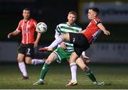 10 February 2023; Ben Doherty of Derry City in action against Darragh Nugent of Shamrock Rovers during the President's Cup match between Derry City and Shamrock Rovers at the Ryan McBride Brandywell Stadium in Derry. Photo by Stephen McCarthy/Sportsfile