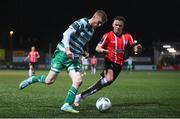 10 February 2023; Darragh Nugent of Shamrock Rovers in action against Ben Doherty of Derry City during the President's Cup match between Derry City and Shamrock Rovers at the Ryan McBride Brandywell Stadium in Derry. Photo by Stephen McCarthy/Sportsfile