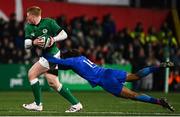 10 February 2023; Paddy McCarthy of Ireland is tackled by Théo Attissogbe of France during the U20 Six Nations Rugby Championship match between Ireland and France at Musgrave Park in Cork. Photo by Eóin Noonan/Sportsfile