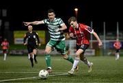 10 February 2023; Matthew Ward of Derry City in action against Aaron Greene of Shamrock Rovers during the President's Cup match between Derry City and Shamrock Rovers at the Ryan McBride Brandywell Stadium in Derry. Photo by Stephen McCarthy/Sportsfile