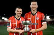 10 February 2023; Michael Duffy, left, and Shane McEleney of Derry City with the President's Cup after the President's Cup match between Derry City and Shamrock Rovers at the Ryan McBride Brandywell Stadium in Derry. Photo by Stephen McCarthy/Sportsfile