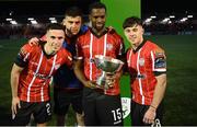 10 February 2023; Derry City players, from left, Jordan McEneff, Cian Kavanagh, Sadou Diallo and Adam O'Reilly with the President's Cup after the President's Cup match between Derry City and Shamrock Rovers at the Ryan McBride Brandywell Stadium in Derry. Photo by Stephen McCarthy/Sportsfile