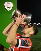 10 February 2023; Adam O'Reilly of Derry City with the President's Cup after the President's Cup match between Derry City and Shamrock Rovers at the Ryan McBride Brandywell Stadium in Derry. Photo by Stephen McCarthy/Sportsfile