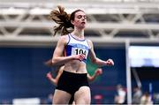 11 February 2023; Katie Doherty of Ratoath AC, Dublin, after winning her Women's 200m heat during the 123.ie National Indoor League Final at Sport Ireland National Indoor Arena in Dublin. Photo by Ben McShane/Sportsfile