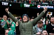 11 February 2023; An Ireland supporter celebrates his side's second try scored by James Lowe during the Guinness Six Nations Rugby Championship match between Ireland and France at the Aviva Stadium in Dublin. Photo by Seb Daly/Sportsfile