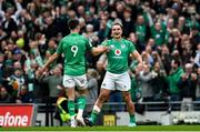 11 February 2023; James Lowe of Ireland celebrates with teammate Conor Murray after scoring his side's second try during the Guinness Six Nations Rugby Championship match between Ireland and France at the Aviva Stadium in Dublin. Photo by Harry Murphy/Sportsfile