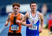 11 February 2023; Marcus Clarke of Ratoath AC, right, and James Tanner of Nenagh Olympic AC, Tipperary, compete in the Men's 3000m during the 123.ie National Indoor League Final at Sport Ireland National Indoor Arena in Dublin. Photo by Ben McShane/Sportsfile