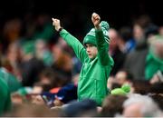 11 February 2023; A young Ireland supporter celebrates his side's third try scored by James Lowe during the Guinness Six Nations Rugby Championship match between Ireland and France at the Aviva Stadium in Dublin. Photo by Seb Daly/Sportsfile