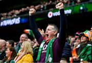 11 February 2023; An Ireland supporter celebrates after his team scores their first try scored by Hugo Keenan during the Guinness Six Nations Rugby Championship match between Ireland and France at the Aviva Stadium in Dublin. Photo by Seb Daly/Sportsfile