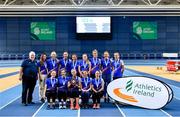 11 February 2023; Women's winners Dundrum South Dublin AC, Dublin, with Athletics Ireland president John Cronin, left, after the 123.ie National Indoor League Final at Sport Ireland National Indoor Arena in Dublin. Photo by Ben McShane/Sportsfile