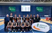 11 February 2023; First place Men's finishers Clonliffe Harriers AC, Dubin, with Athletics Ireland president John Cronin after the 123.ie National Indoor League Final at Sport Ireland National Indoor Arena in Dublin. Photo by Ben McShane/Sportsfile