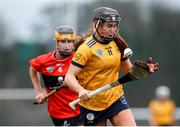 11 February 2023; Kate Kenny of DCU in action against Aoife Healy of UCC during the Electric Ireland Ashbourne Cup Semi Final between UCC and DCU at UCD in Dublin. Photo by Michael P Ryan/Sportsfile