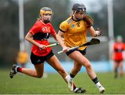 11 February 2023; Kate Kenny of DCU in action against Aoife Healy of UCC during the Electric Ireland Ashbourne Cup Semi Final between UCC and DCU at UCD in Dublin. Photo by Michael P Ryan/Sportsfile