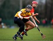 11 February 2023; Ciara O'Looney of DCU in action against Clodagh Carroll of UCC during the Electric Ireland Ashbourne Cup Semi Final between UCC and DCU at UCD in Dublin. Photo by Michael P Ryan/Sportsfile