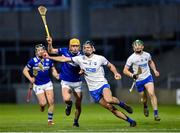 11 February 2023; Mark Fitzgerald of Waterford under pressure from James Keyes of Laois during the Allianz Hurling League Division 1 Group B match between Laois and Waterford at Laois Hire O'Moore Park in Portlaoise, Laois. Photo by Stephen Marken/Sportsfile