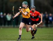 11 February 2023; Caoimhe Coady of DCU in action against Laura Hayes of UCC  during the Electric Ireland Ashbourne Cup Semi Final between UCC and DCU at UCD in Dublin. Photo by Michael P Ryan/Sportsfile