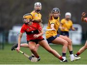 11 February 2023; Aoife Healy of UCC in action against Kate Kenny of DCU during the Electric Ireland Ashbourne Cup Semi Final between UCC and DCU at UCD in Dublin. Photo by Michael P Ryan/Sportsfile