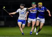 11 February 2023; Jamie Barron of Waterford in action against Ian Shanahan, right, and Ross King of Laois during the Allianz Hurling League Division 1 Group B match between Laois and Waterford at Laois Hire O'Moore Park in Portlaoise, Laois. Photo by Piaras Ó Mídheach/Sportsfile