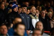 11 February 2023; Limerick captain Declan Hannon, left, with teammates Colin Coughlan and William O'Donoghue watch from the stands before the Allianz Hurling League Division 1 Group A match between Limerick and Clare at TUS Gaelic Grounds in Limerick. Photo by Eóin Noonan/Sportsfile