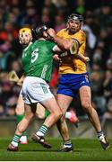 11 February 2023; Conor Cleary of Clare is tackled by Peter Casey of Limerick during the Allianz Hurling League Division 1 Group A match between Limerick and Clare at TUS Gaelic Grounds in Limerick. Photo by Eóin Noonan/Sportsfile