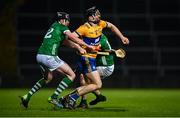 11 February 2023; David McInerney of Clare is tackled by Micheal Houlihan of Limerick during the Allianz Hurling League Division 1 Group A match between Limerick and Clare at TUS Gaelic Grounds in Limerick. Photo by Eóin Noonan/Sportsfile