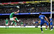 11 February 2023; Romain Ntamack of France kicks downfield under pressure from Craig Casey of Ireland during the Guinness Six Nations Rugby Championship match between Ireland and France at the Aviva Stadium in Dublin. Photo by Seb Daly/Sportsfile
