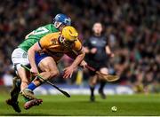 11 February 2023; Mark Rodgers of Clare in action against Ciaran Barry of Limerick during the Allianz Hurling League Division 1 Group A match between Limerick and Clare at TUS Gaelic Grounds in Limerick. Photo by John Sheridan/Sportsfile