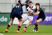 10 February 2023; David Barr of Belvedere College in action against Alex Hamilton, left, and Matthew Wystepek of Wesley College during the Bank of Ireland Leinster Rugby Schools Junior Cup First Round match between Wesley College and Belvedere College at Energia Park in Dublin. Photo by Tyler Miller/Sportsfile