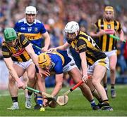 12 February 2023; Ronan Maher of Tipperary in action against John Donnelly and Martin Keoghan of Kilkenny during the Allianz Hurling League Division 1 Group B match between Kilkenny and Tipperary at UPMC Nowlan Park in Kilkenny. Photo by Stephen Marken/Sportsfile