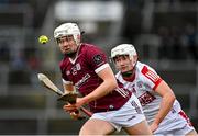 12 February 2023; Martin McManus of Galway in action against Eoin Roche of Cork during the Allianz Hurling League Division 1 Group A match between Galway and Cork at Pearse Stadium in Galway. Photo by Seb Daly/Sportsfile