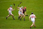 12 February 2023; Tom Monaghan of Galway in action against Cork players, from left, Cormac O’Brien, Shane Barrett and Sam Quirke during the Allianz Hurling League Division 1 Group A match between Galway and Cork at Pearse Stadium in Galway. Photo by Seb Daly/Sportsfile