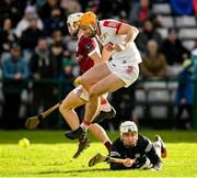 12 February 2023; Sean Twomey of Cork jumps over Galway goalkeeper Darach Fahy after scoring his side's second goal during the Allianz Hurling League Division 1 Group A match between Galway and Cork at Pearse Stadium in Galway. Photo by Seb Daly/Sportsfile